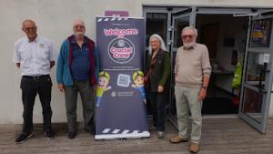 Rotarians Mike Gicquel, Keith Thomas, David Simons and Pam Baktis at City College